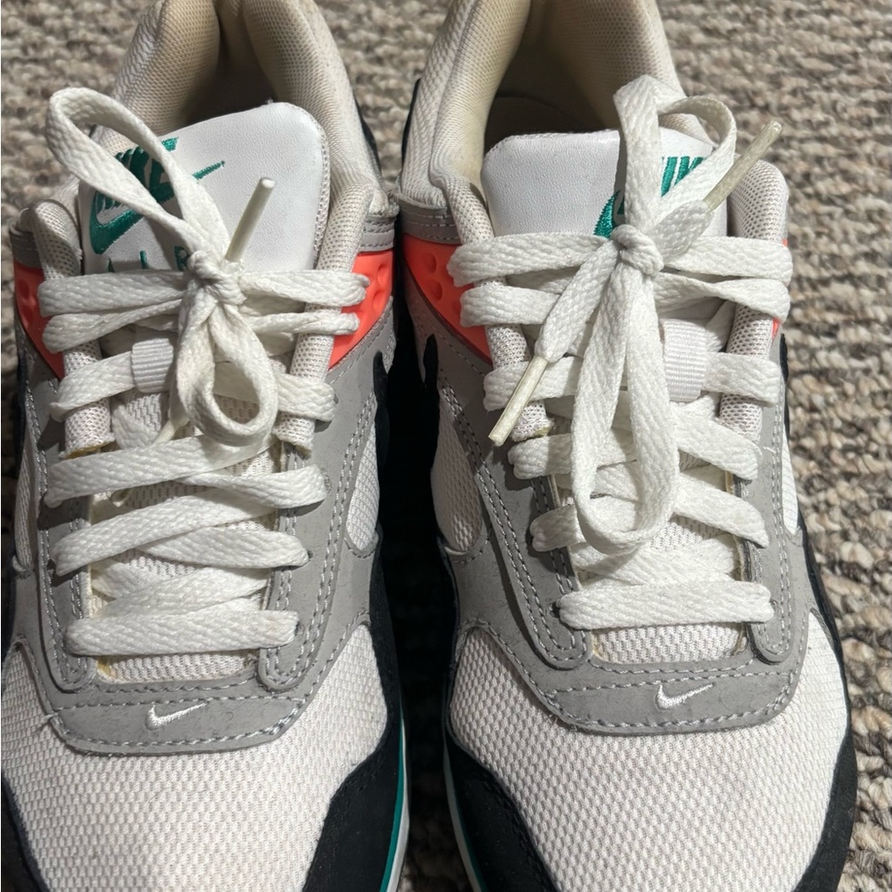 Nike White and Gray Shoes with Coral Highlights